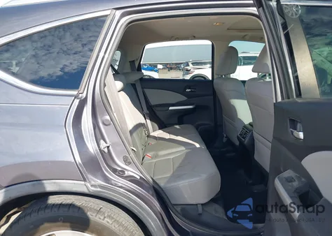 2015 Honda Cr-V Touring z USA, uszkodzony, nr VIN 5J6RM3H94FL020849